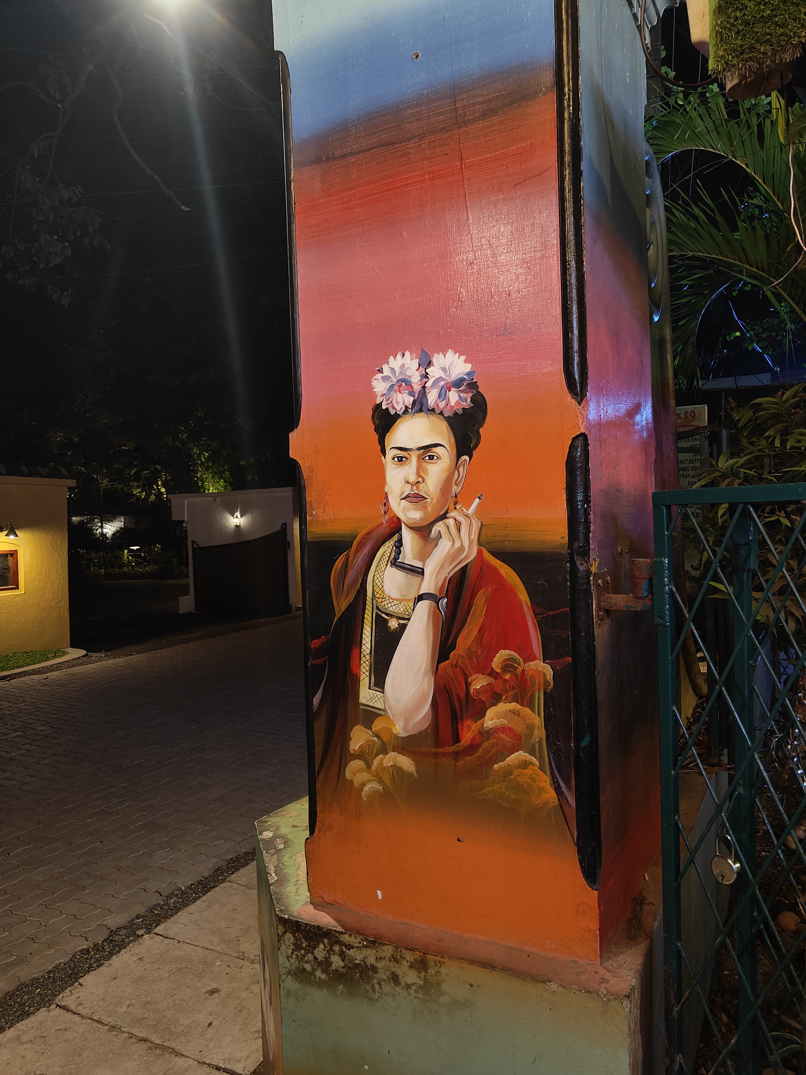 Frida Kahlo portrait on a gate pillar in Kochi, Kerala. December 2023