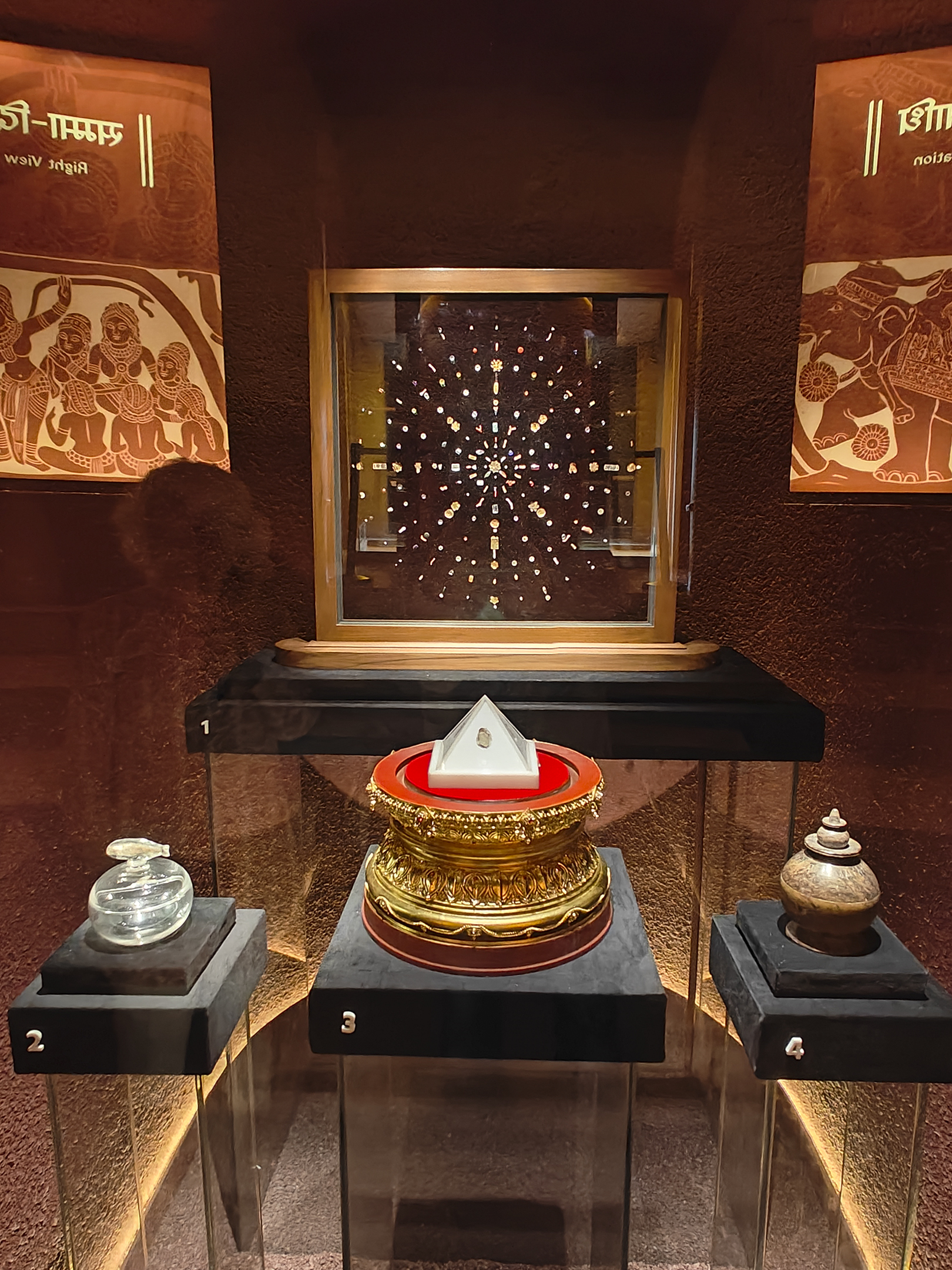 the real stuff, the gems and the containers with Buddha's ashes