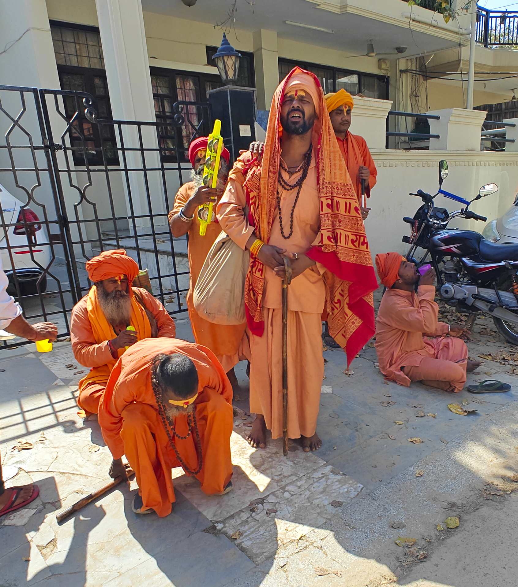 A group of singing minstrels resting outside the gate of our nextdoor neighbour. they said they were proceeding to Khatuji Shyam in Rajasthan